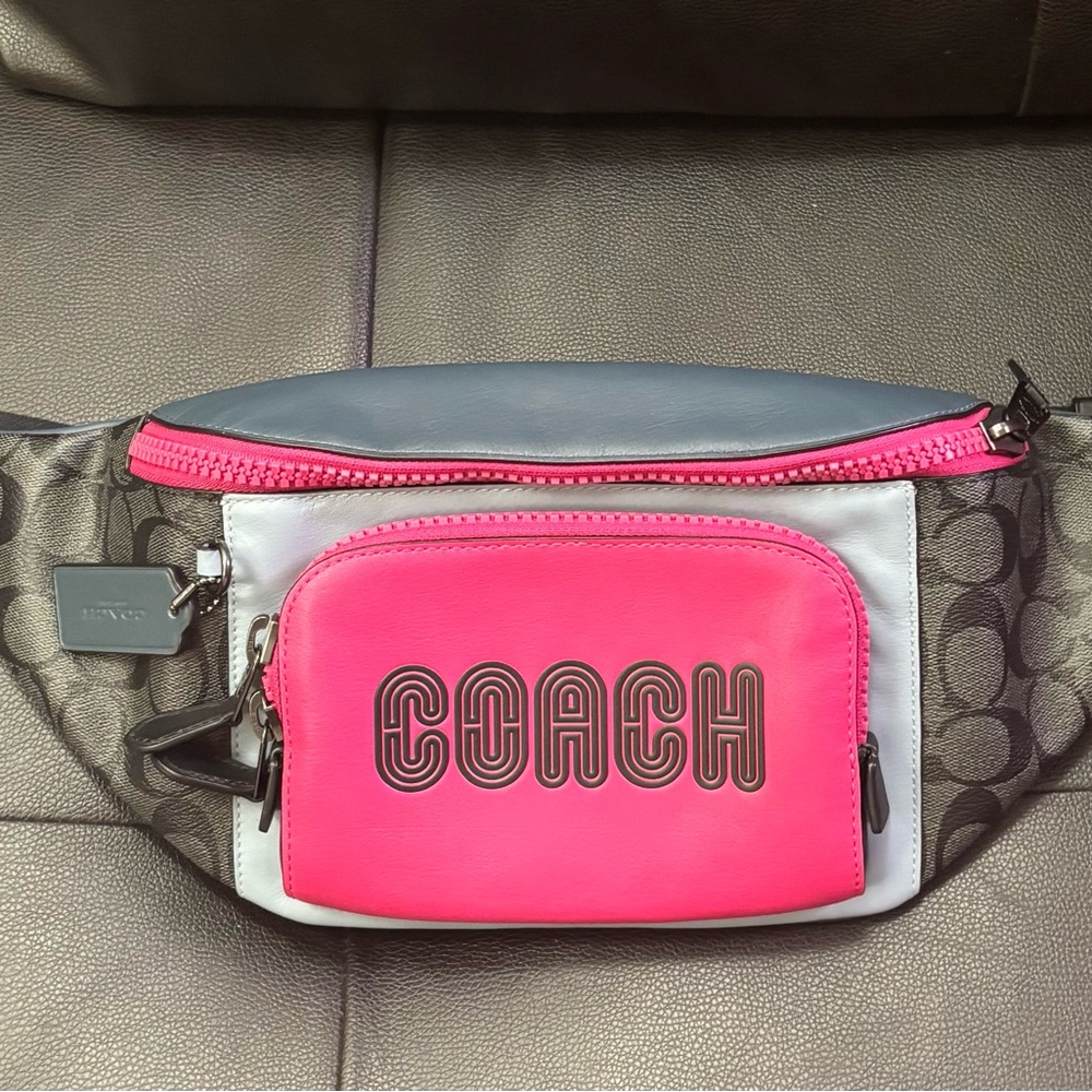 Used Coach Red and Gray Crossbody Bag with Modern Design.